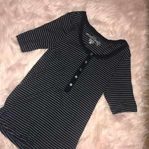 Dark blue and white striped organic cotton shirt.